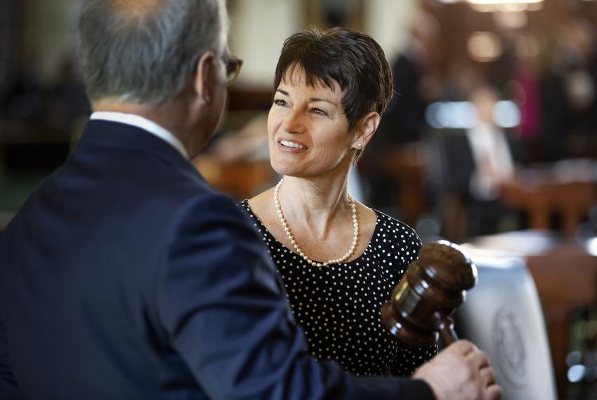 State Sen. Donna Campbell, R-New Braufels, speaks with State Sen. Kirk Watson, D-Austin, shortly after he received the gavel as Senate President Pro Tempore on Jan. 9, 2019.